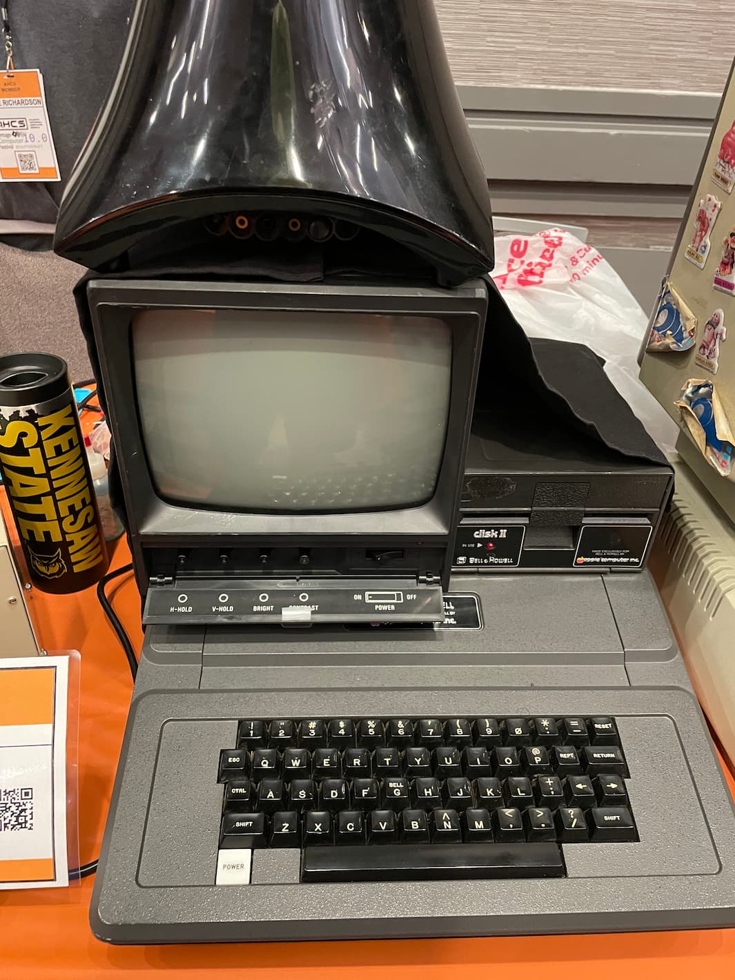 A dark-gray Apple II produced in partnership with Bell & Howell.